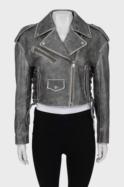 Leather jacket with lacing on the sides