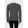 Gray cardigan decorated with buttons