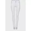 White mid rise skinny jeans