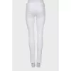 White mid rise skinny jeans