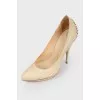 Beige studded pumps
