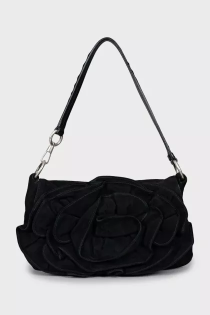 Suede bag decorated with a flower