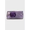Textile clutch decorated with flowers
