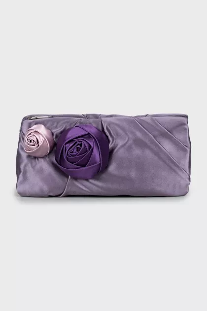 Textile clutch decorated with flowers