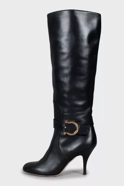 Leather boots with gold buckle