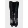Leather boots with gold buckle