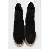 Suede boots with contrasting soles