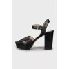 Black sandals with leather straps