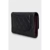 Quilted wallet with brand logo