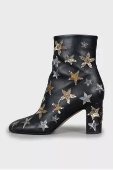 Leather ankle boots decorated with sequins