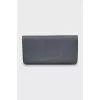 Leather wallet with buttons