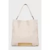 Leather shopper with metal base