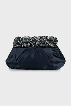 Clutch decorated with rhinestones and drapery
