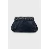 Clutch decorated with rhinestones and drapery