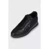 Black leather platform sneakers