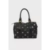 Black bag with eyelets