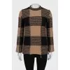 Checkered sweater with fringe