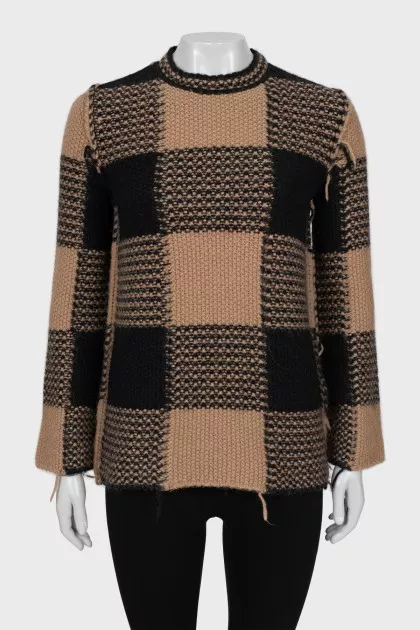 Checkered sweater with fringe