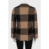 Checkered sweater with fringe
