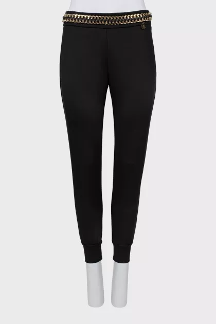 Slim fit trousers with waistband decoration