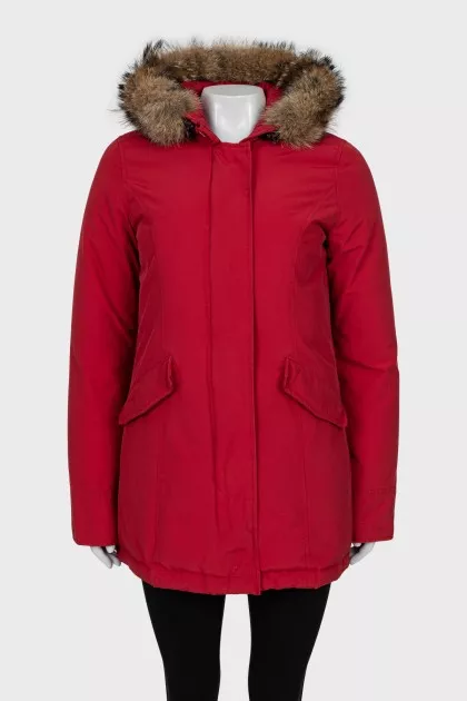 Red parka with fur on the hood