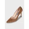 Brown suede pumps