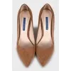 Brown suede pumps