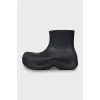 Rubber boots with massive soles