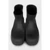 Rubber boots with massive soles