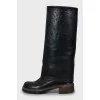 Leather boots with embossed print
