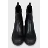 Leather boots with a massive sole