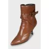 Brown ankle boots with leather straps