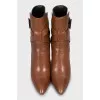 Brown ankle boots with leather straps
