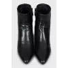 Black leather ankle boots with logo