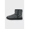 Suede ugg boots decorated with spikes