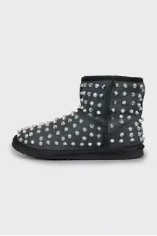 Suede ugg boots decorated with spikes