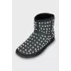 Suede ugg boots decorated with spikes