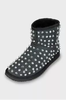 Suede ugg boots decorated with spikes