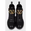 Leather boots with massive logo