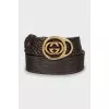 Brown belt with gold buckle