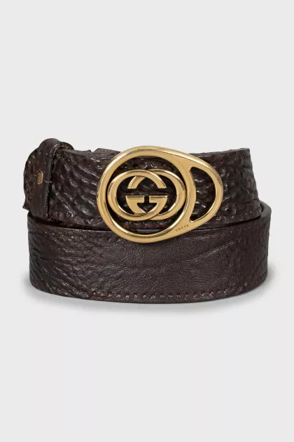 Brown belt with gold buckle