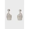 Silver earrings with tag