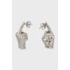 Silver earrings with tag