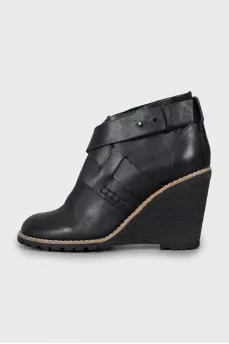 Leather ankle boots with high wedge heels