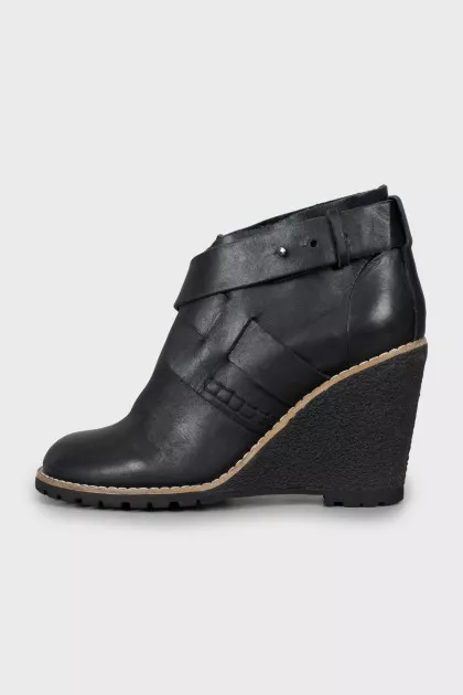 Leather ankle boots with high wedge heels