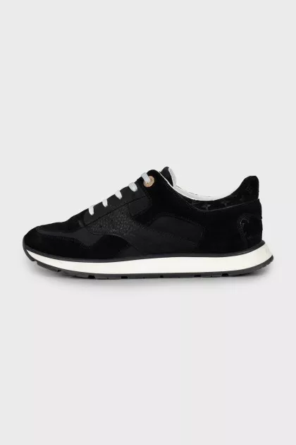 Sneakers with branded embossing on suede