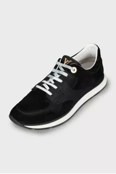 Sneakers with branded embossing on suede