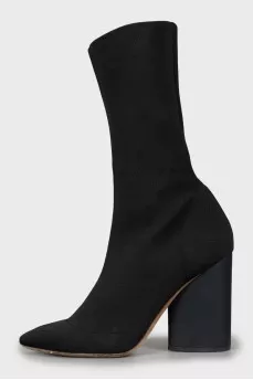 Ankle boots made of textile with a figured heel