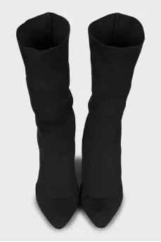 Ankle boots made of textile with a figured heel
