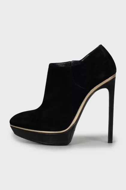 Suede ankle boots with gold decor